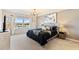 Main bedroom with lake view and neutral decor at 7143 Oakmoss Loop, Davenport, FL 33837