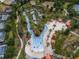Aerial view of a relaxing lazy river winding through a lush landscape at 7143 Oakmoss Loop, Davenport, FL 33837