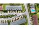 Aerial view of townhouses, community pool, and ample parking at 889 Park Grove Ct, Orlando, FL 32828