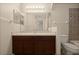 Clean bathroom with dark wood vanity, tiled shower, and toilet at 889 Park Grove Ct, Orlando, FL 32828