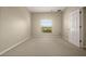 Empty bedroom with neutral walls and carpet at 889 Park Grove Ct, Orlando, FL 32828