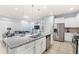 Spacious kitchen with island, stainless steel appliances and breakfast bar at 2015 Majorca Drive, Kissimmee, FL 34747