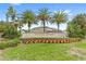 Entrance to Windsor at Westside community with lush landscaping at 2015 Majorca Drive, Kissimmee, FL 34747