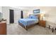 Spacious bedroom with a comfortable bed and plenty of natural light at 2015 Majorca Drive, Kissimmee, FL 34747