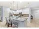 Modern kitchen with granite countertops, stainless steel appliances and island at 2015 Majorca Drive, Kissimmee, FL 34747