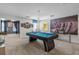 Game room with a pool table, providing entertainment for residents and guests at 4637 Target Blvd, Kissimmee, FL 34746