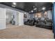 Home theater with theater seating and movie posters at 4637 Target Blvd, Kissimmee, FL 34746