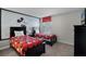 Twin bedroom with Mickey Mouse themed bedding and a wall mural at 4637 Target Blvd, Kissimmee, FL 34746