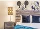 Bedroom with a queen bed and Mickey Mouse decor at 4637 Target Blvd, Kissimmee, FL 34746