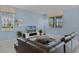 Spacious living room with sectional sofa and large TV at 4637 Target Blvd, Kissimmee, FL 34746