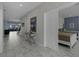 Elegant marble hallway with access to bedrooms and living areas at 4637 Target Blvd, Kissimmee, FL 34746