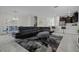 Open concept living area with sectional sofa and dining area view at 4637 Target Blvd, Kissimmee, FL 34746