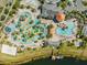 Community pool with lazy river, waterslide and multiple lounging areas at 4637 Target Blvd, Kissimmee, FL 34746