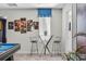 Game room features a pool table and seating area with a glass-top table and bar stools at 4637 Target Blvd, Kissimmee, FL 34746