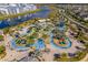 Community pool with lazy river, waterslide and plenty of lounge chairs at 4637 Target Blvd, Kissimmee, FL 34746