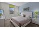 Bright bedroom featuring a comfortable bed and stylish decor at 4637 Target Blvd, Kissimmee, FL 34746