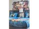 Twin bedroom with LEGO-themed bedding and wall art at 4637 Target Blvd, Kissimmee, FL 34746