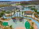 Resort-style pool with lazy river, playground, and shaded seating areas at 4637 Target Blvd, Kissimmee, FL 34746