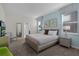Spacious main bedroom with neutral color palette and large windows at 4637 Target Blvd, Kissimmee, FL 34746