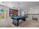 Game room with a pool table and a view of a loft area at 4637 Target Blvd, Kissimmee, FL 34746