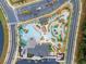 Community pool with lazy river, playground and plenty of lounge chairs at 4637 Target Blvd, Kissimmee, FL 34746