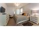 Spacious bedroom with king-size bed and ample dresser space at 5237 Oakbourne Ave, Davenport, FL 33837