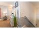 Bright hallway with decorative wall and access to bedrooms at 5237 Oakbourne Ave, Davenport, FL 33837