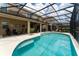 Screened pool and patio area with plenty of seating at 5237 Oakbourne Ave, Davenport, FL 33837