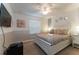 Spacious bedroom with king-size bed, TV, and ample natural light at 5237 Oakbourne Ave, Davenport, FL 33837
