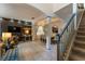 View of the home's interior, including a staircase and open floor plan at 5237 Oakbourne Ave, Davenport, FL 33837