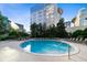 Refreshing circular pool with plenty of lounge chairs at 155 S Court Ave # 2503, Orlando, FL 32801