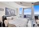 Bright bedroom with a king-size bed and city views at 155 S Court Ave # 2503, Orlando, FL 32801