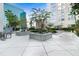 Relaxing courtyard with lush landscaping and seating areas at 155 S Court Ave # 2503, Orlando, FL 32801