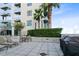 Outdoor patio with grill and lounge chairs at 155 S Court Ave # 2503, Orlando, FL 32801