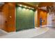 Elegant lobby with a green wall water feature at 155 S Court Ave # 2503, Orlando, FL 32801