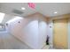 Residential hallway with carpeted floor and light walls at 155 S Court Ave # 2503, Orlando, FL 32801
