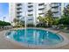 Enjoy this resort-style oval pool with plenty of lounge chairs at 155 S Court Ave # 2503, Orlando, FL 32801