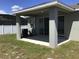 Large covered patio perfect for outdoor entertaining at 8073 Cherrystone St, Leesburg, FL 34748