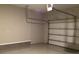 Spacious garage with epoxy flooring and automatic garage door opener at 8073 Cherrystone St, Leesburg, FL 34748