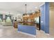 Modern kitchen with stainless steel appliances and breakfast bar at 25515 Hawks Run Ln, Sorrento, FL 32776