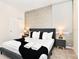 Elegant bedroom with king-size bed and stylish decor at 7252 Oakmoss Loop, Davenport, FL 33837