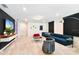 Finished basement ideal for entertainment and relaxation at 7252 Oakmoss Loop, Davenport, FL 33837