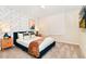 Bedroom with a queen-size bed, floral wallpaper, and a TV at 7252 Oakmoss Loop, Davenport, FL 33837