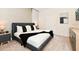 Spacious bedroom with plush bed and modern nightstands at 7252 Oakmoss Loop, Davenport, FL 33837