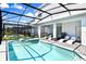 Enjoy this private pool and spa with plenty of seating at 7252 Oakmoss Loop, Davenport, FL 33837