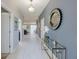 Bright entryway with tile floors and modern decor at 9076 Hazard St, Davenport, FL 33896