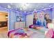 Frozen themed bedroom with two twin beds and a TV at 9076 Hazard St, Davenport, FL 33896