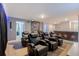 Home theater with reclining seats and movie decor at 9076 Hazard St, Davenport, FL 33896