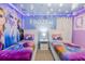 Frozen themed bedroom with two twin beds and mural at 9076 Hazard St, Davenport, FL 33896