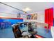 Game room with pool table, foosball, and gaming chairs at 9076 Hazard St, Davenport, FL 33896